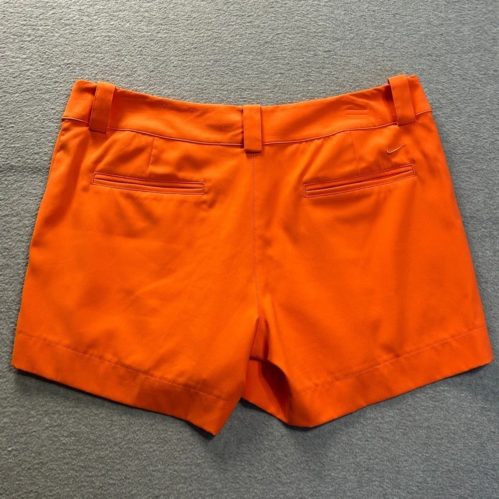 Nike Golf Tour Performance Golf Shorts Womens 10 Orange Dri-FIT Athletic Outdoor
